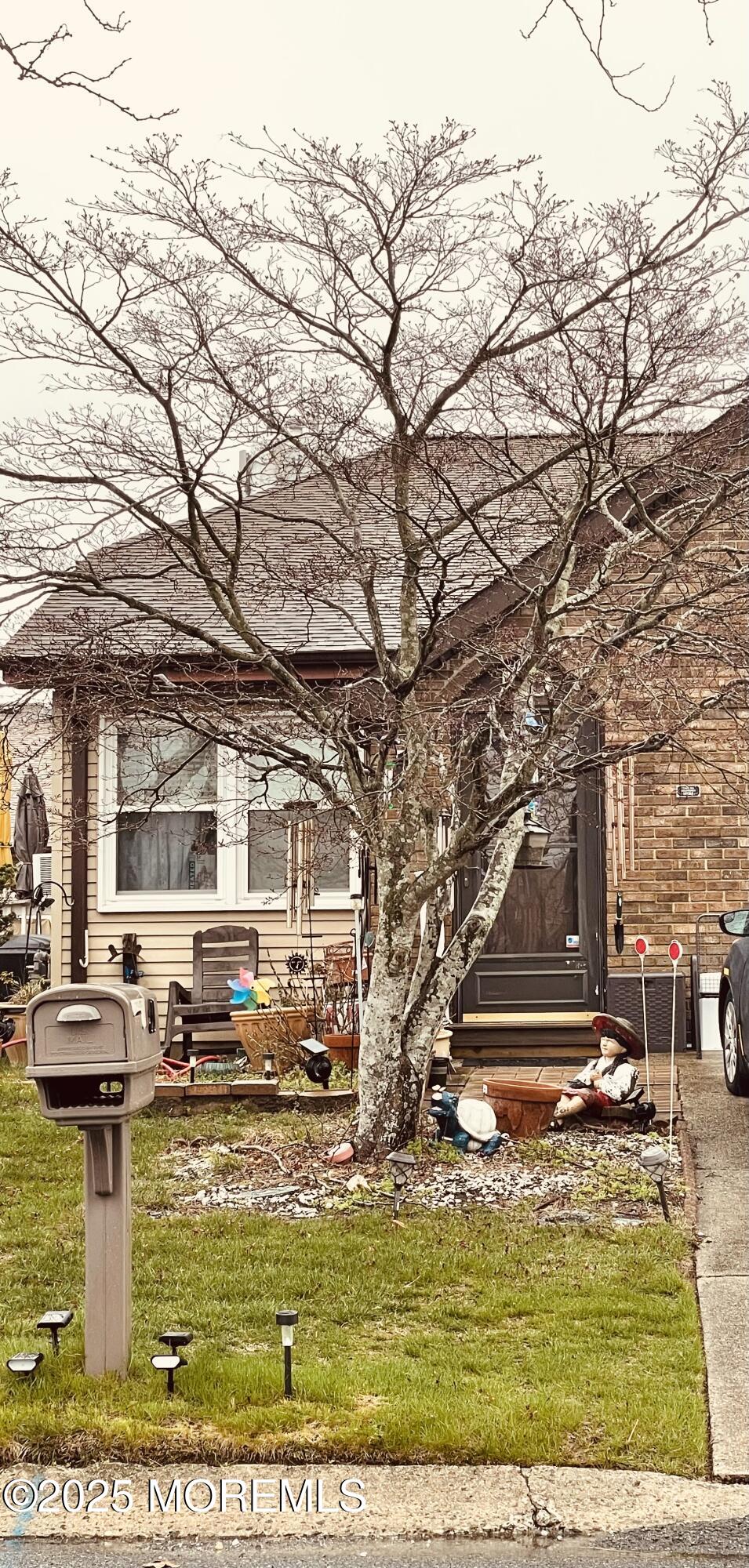 50 Sycamore Access Road Manahawkin, NJ 08050 - Photo 2 of 5 a view of swimming pool with outdoor seating