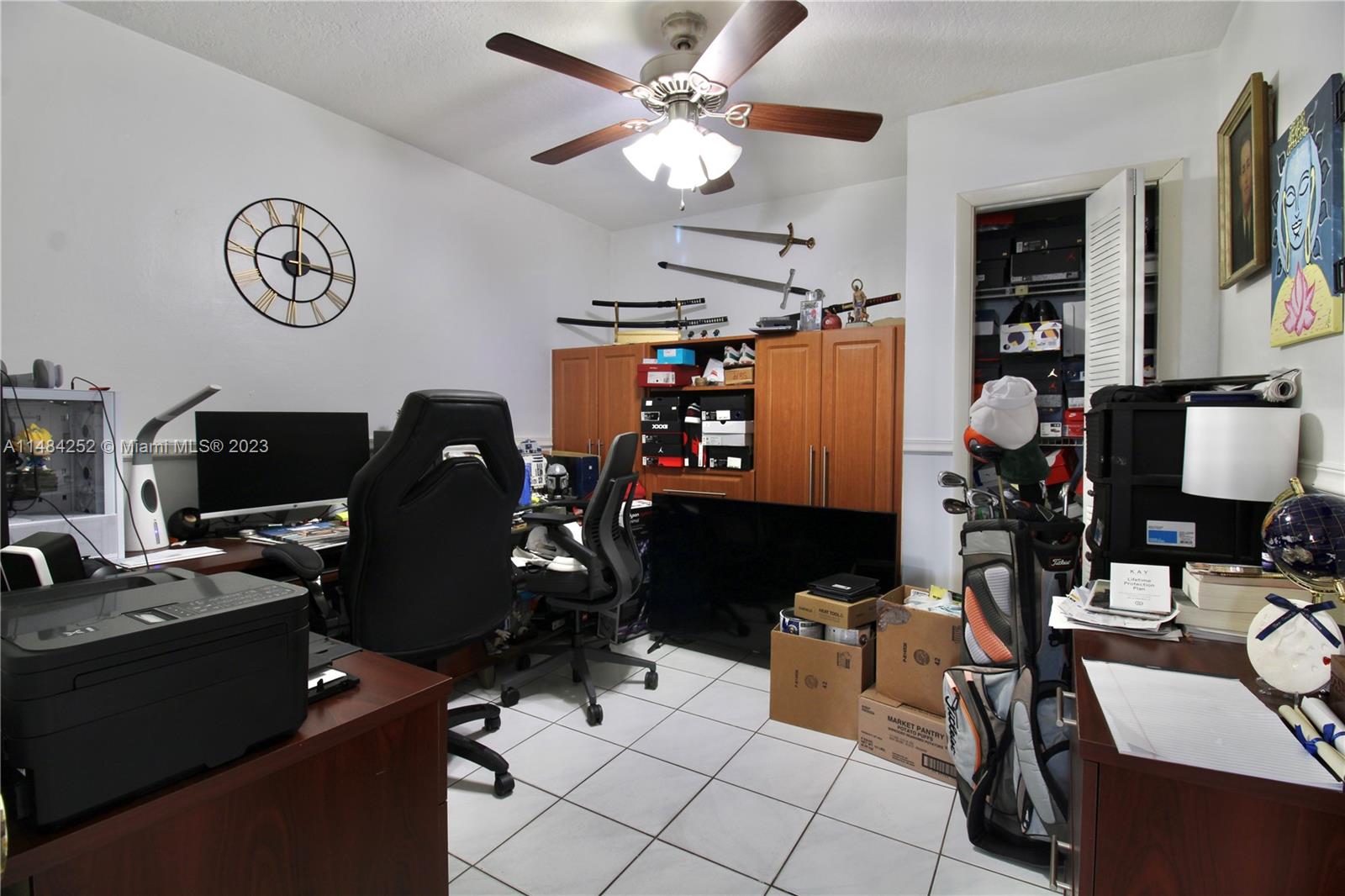 1085 West 23rd Street Hialeah, FL 33010 - Photo 14 of 32 a view of a workspace with furniture and a window
