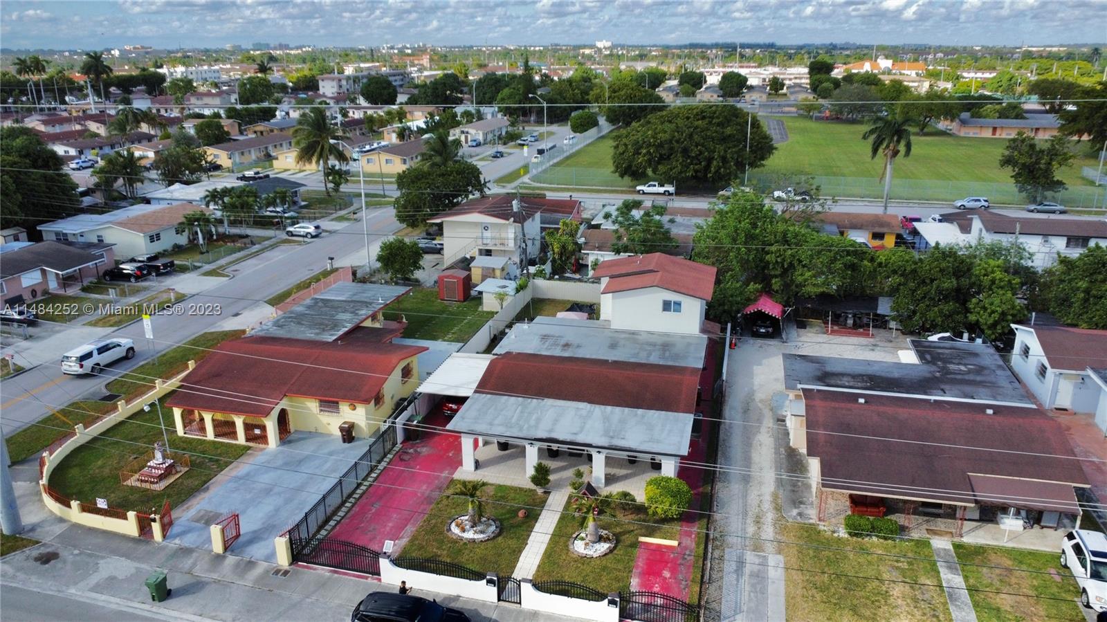 1085 West 23rd Street Hialeah, FL 33010 - Photo 31 of 32 an aerial view of residential houses and outdoor space