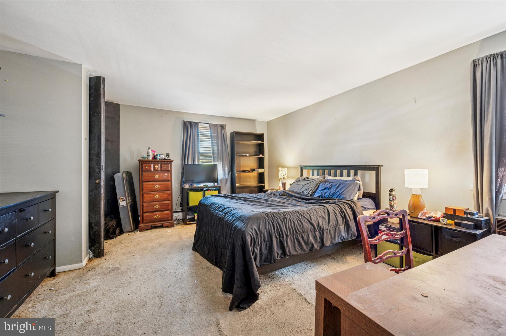 1600 Church Road, Unit A107 Wyncote, PA 19095 - Photo 11 of 15 a bedroom with bed and a closet