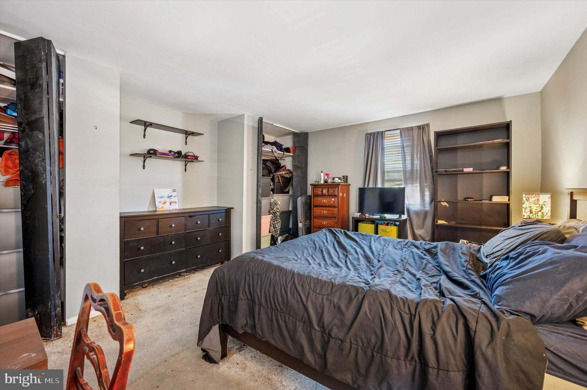 1600 Church Road, Unit A107 Wyncote, PA 19095 - Photo 12 of 15 a bed room with a bed and a closet