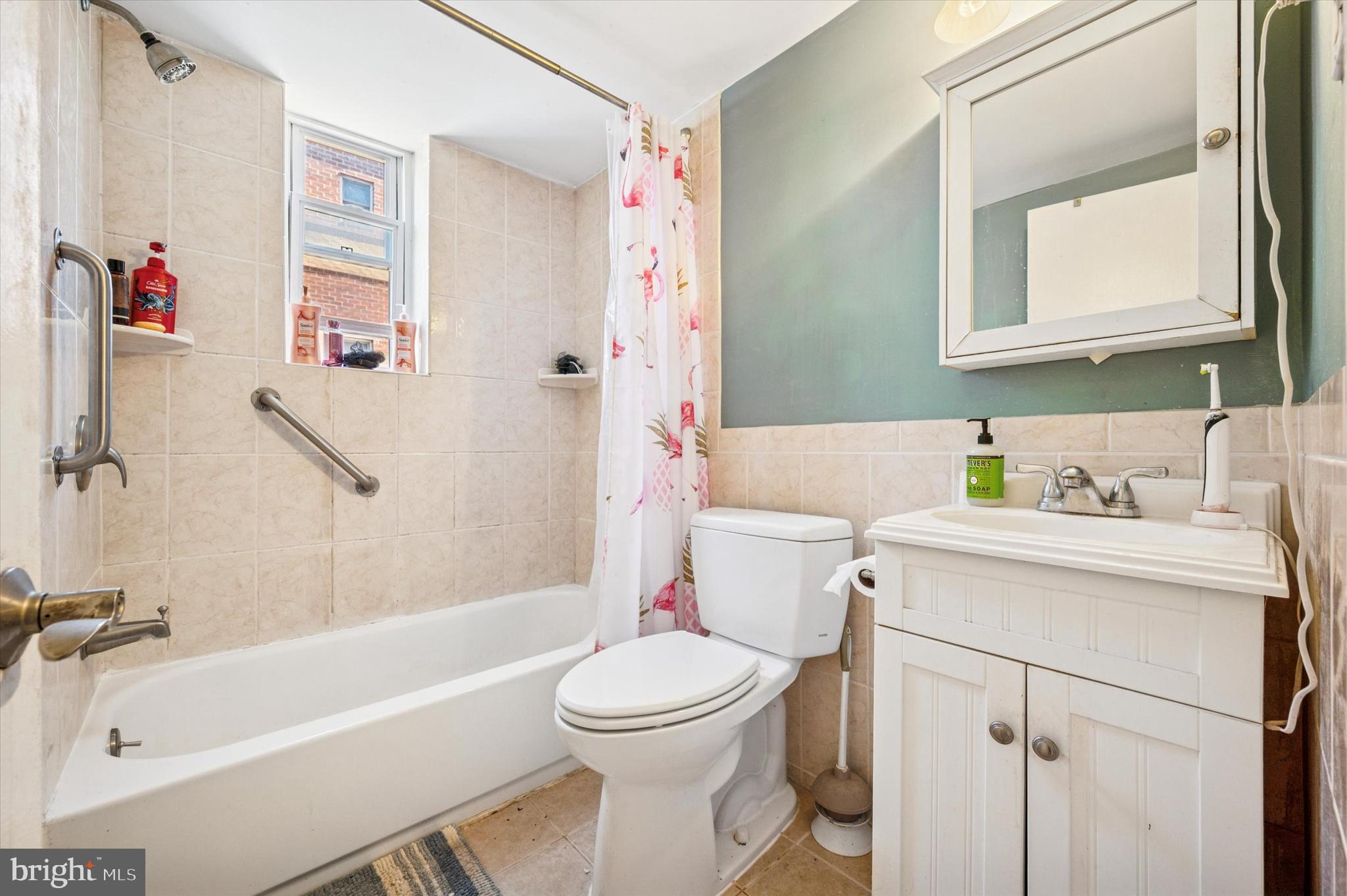1600 Church Road, Unit A107 Wyncote, PA 19095 - Photo 13 of 15 a bathroom with a sink toilet and shower