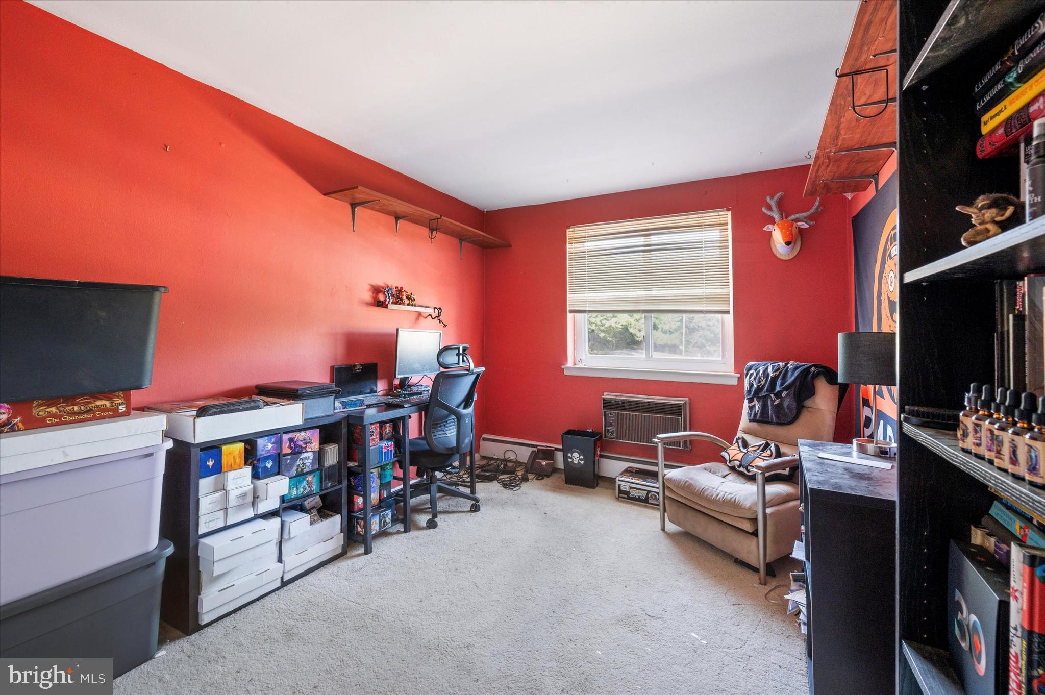 1600 Church Road, Unit A107 Wyncote, PA 19095 - Photo 14 of 15 a living room with furniture a flat screen tv and a window