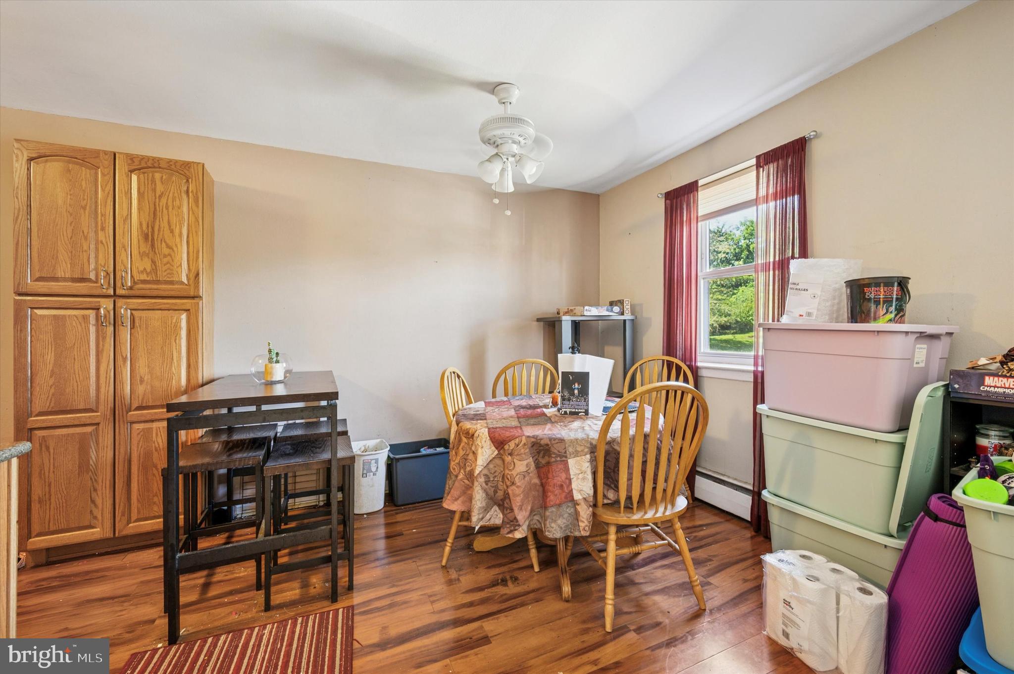 1600 Church Road, Unit A107 Wyncote, PA 19095 - Photo 8 of 15 a view of a dining room with furniture window and wooden floor