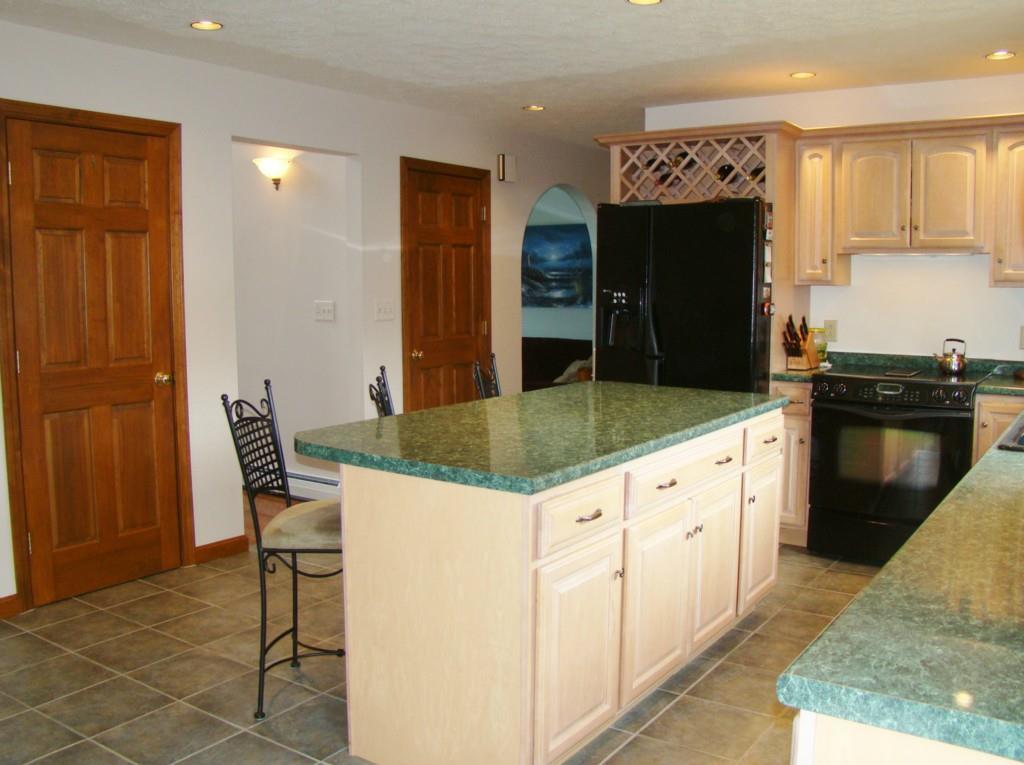 42 Saunders Road Greene, ME 04236 - Photo 12 of 35 Island offers storage for larger...