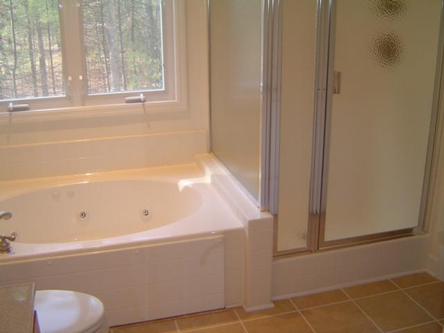 75 Shanleys Loop Ferrum, VA 24088 - Photo 11 of 21 a bathroom with a bathtub