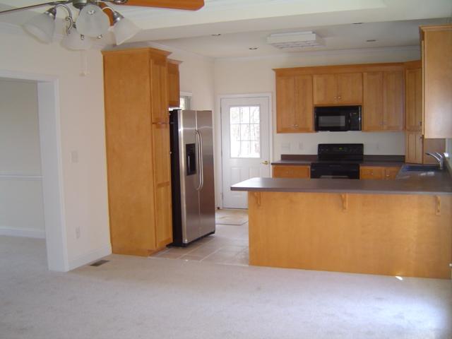 75 Shanleys Loop Ferrum, VA 24088 - Photo 8 of 21 a view of kitchen with stainless steel appliances granite countertop a refrigerator a stove and a sink