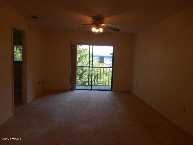 1720 Murrell Road, Unit 222 Rockledge, FL 32955 - Photo 3 of 12 Living/Dining Room