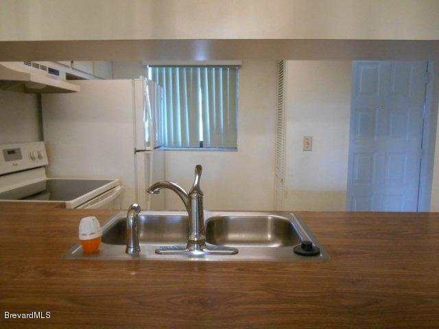 1720 Murrell Road, Unit 222 Rockledge, FL 32955 - Photo 6 of 12 Kitchen from Dining Room