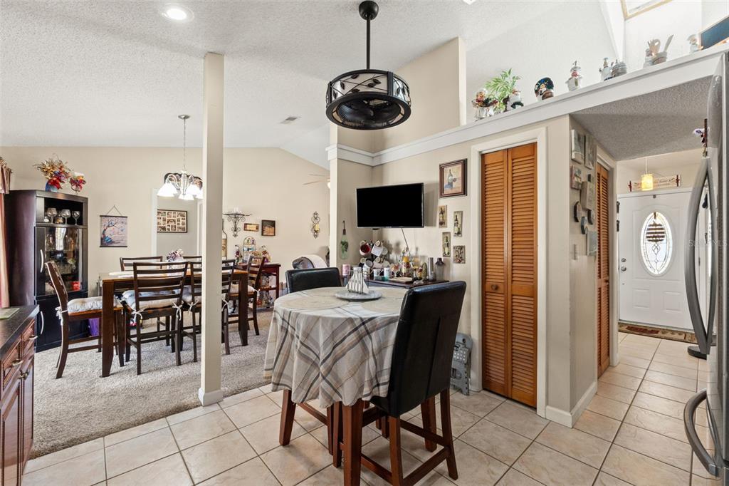 4151 Montano Avenue Spring Hill, FL 34609 - Photo 25 of 34 a view of a dining room with furniture