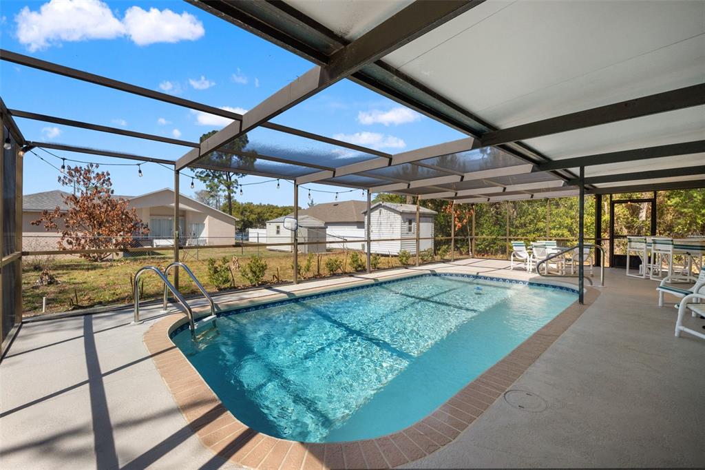 4151 Montano Avenue Spring Hill, FL 34609 - Photo 29 of 34 a view of a swimming pool