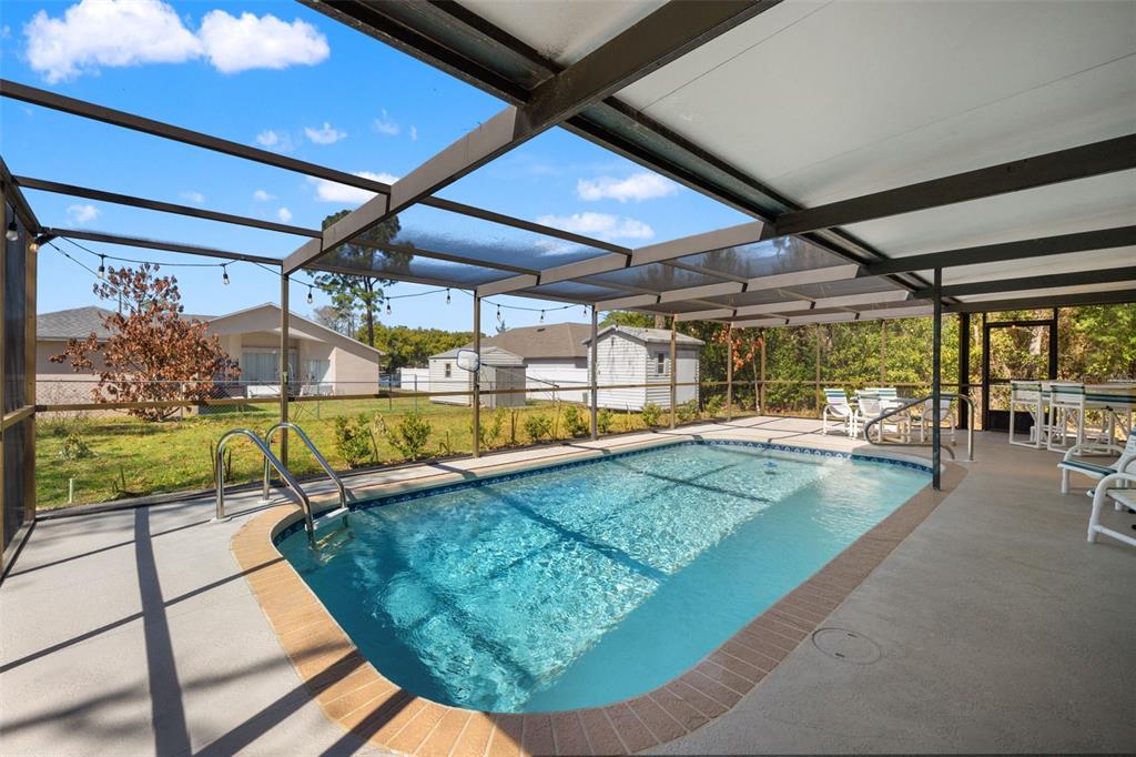 4151 Montano Avenue Spring Hill, FL 34609 - Photo 30 of 34 a view of a swimming pool