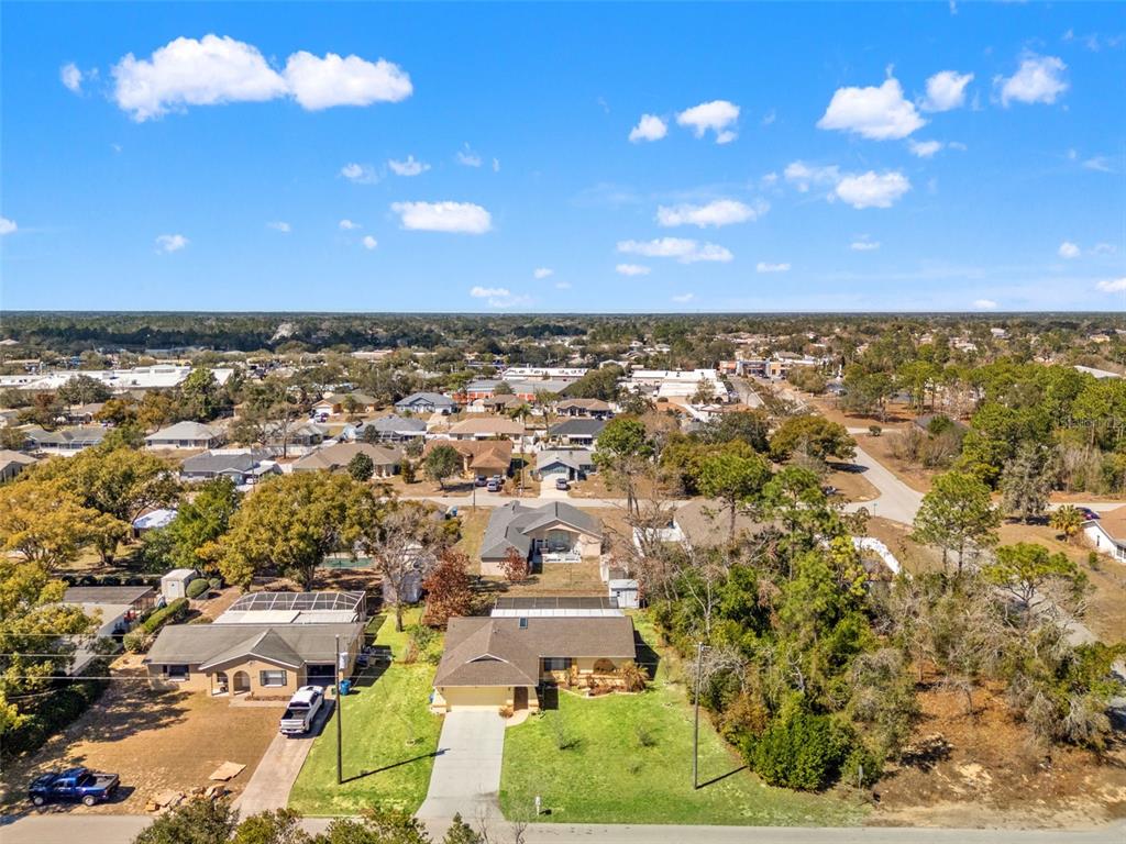4151 Montano Avenue Spring Hill, FL 34609 - Photo 6 of 34 an aerial view of residential building with outdoor space