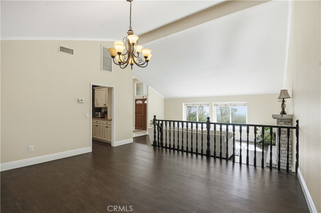 10902 Wilson Avenue Rancho Cucamonga, CA 91737 - Photo 15 of 48 a view of a dining room with wooden floor
