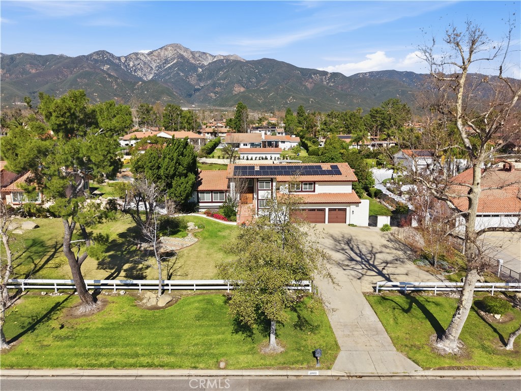 10902 Wilson Avenue Rancho Cucamonga, CA 91737 - Photo 2 of 48 an aerial view of residential houses with outdoor space and river