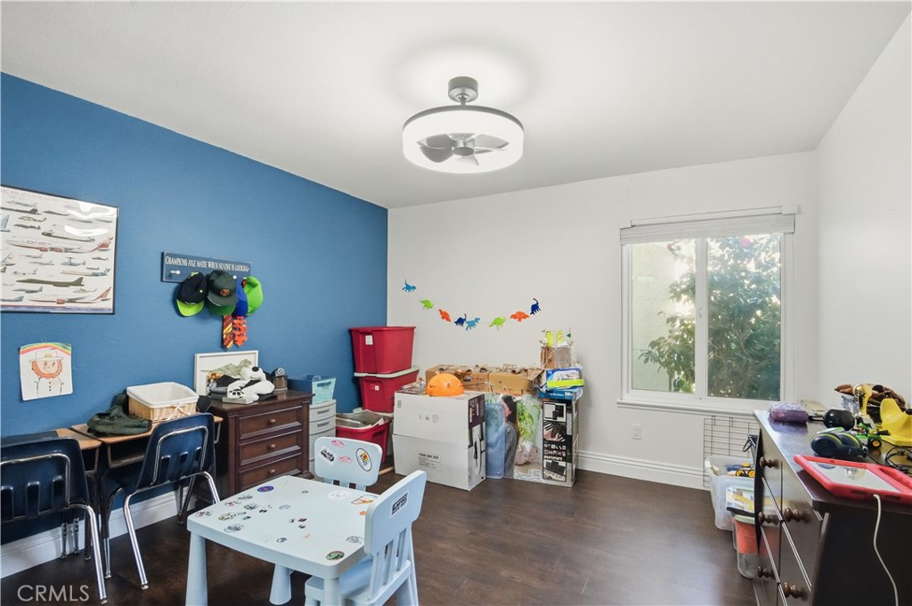 10902 Wilson Avenue Rancho Cucamonga, CA 91737 - Photo 21 of 48 a play room with furniture and a window