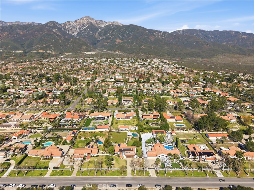 10902 Wilson Avenue Rancho Cucamonga, CA 91737 - Photo 28 of 48 an aerial view of residential houses with outdoor space and trees