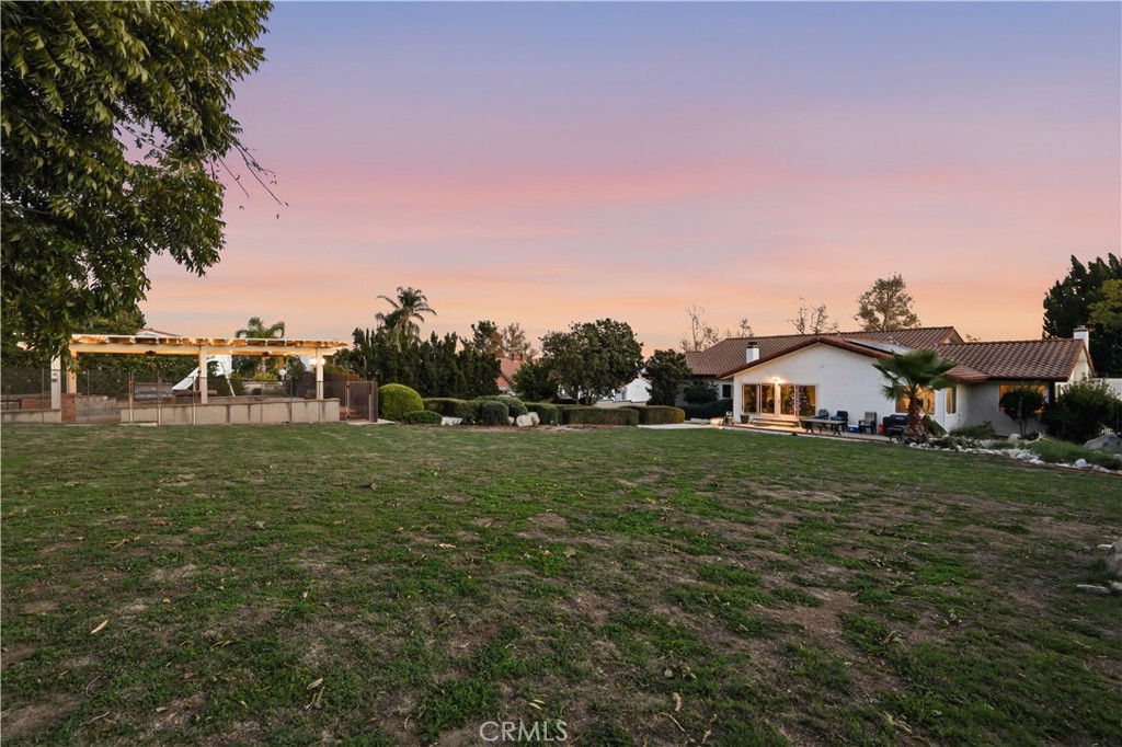10902 Wilson Avenue Rancho Cucamonga, CA 91737 - Photo 42 of 48 a view of a house with a big yard