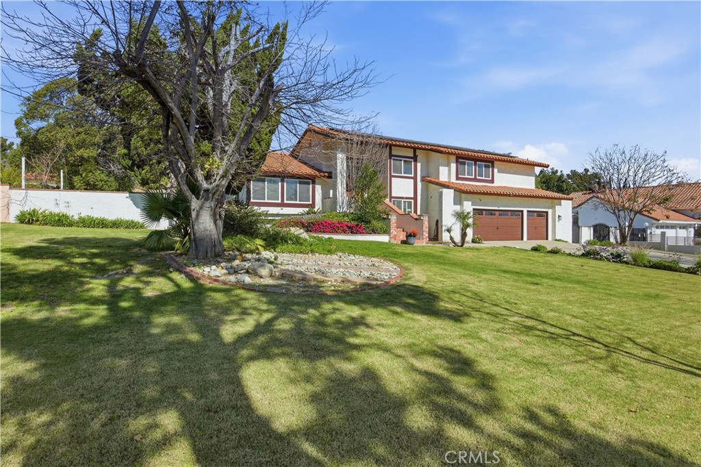 10902 Wilson Avenue Rancho Cucamonga, CA 91737 - Photo 48 of 48 a house view with a garden space