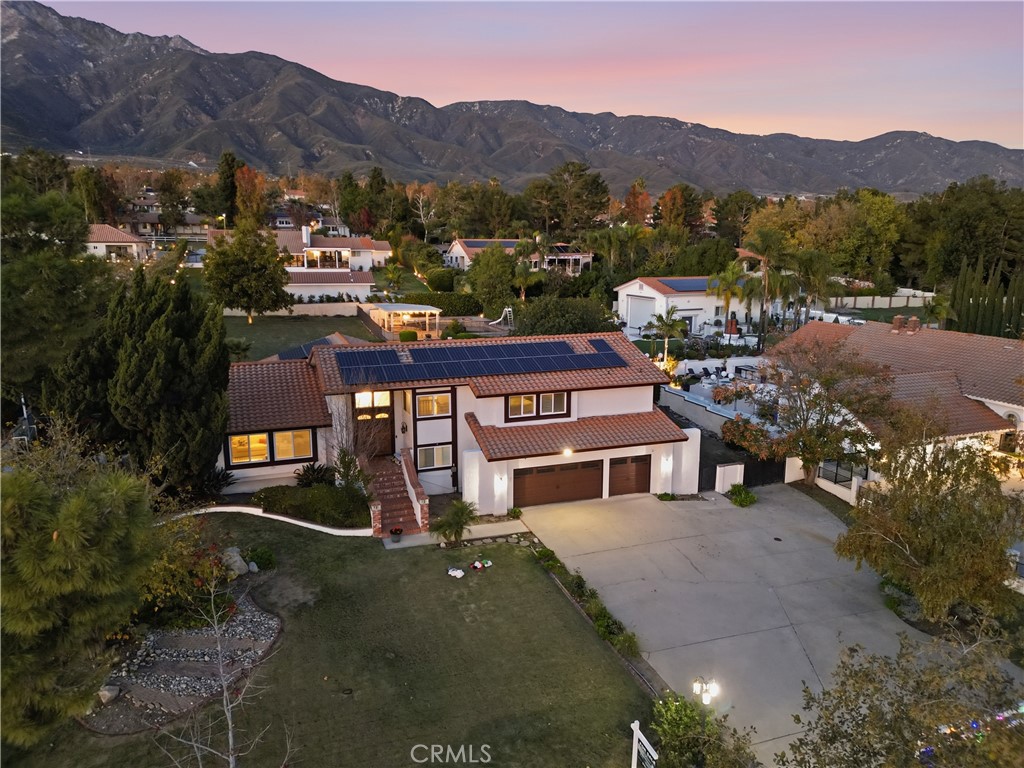 10902 Wilson Avenue Rancho Cucamonga, CA 91737 - Photo 5 of 48 an aerial view of a house with a yard