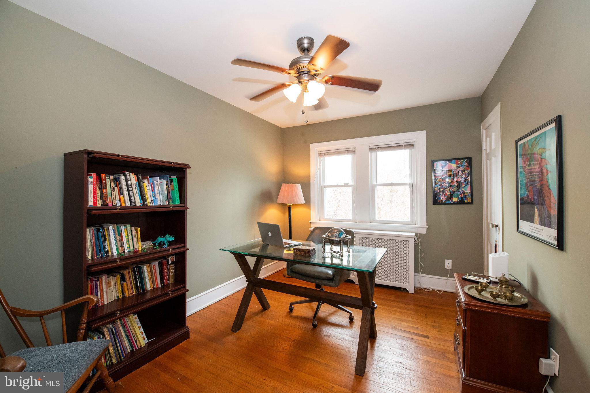467 West Ellet Street Philadelphia, PA 19119 - Photo 23 of 39 a workspace with furniture bookshelf and a window