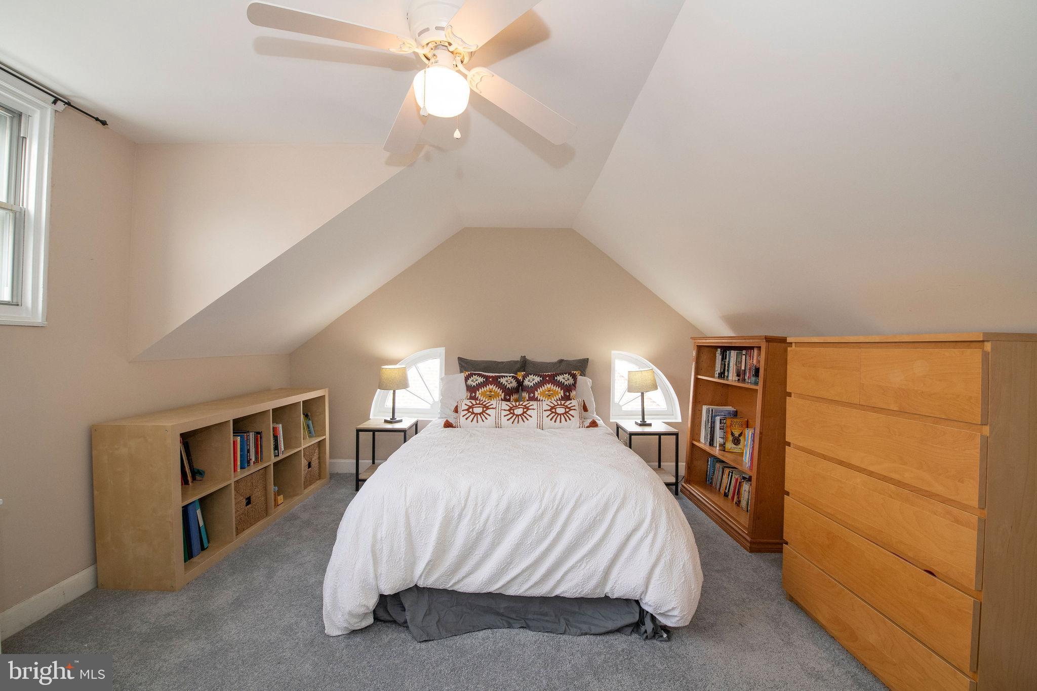 467 West Ellet Street Philadelphia, PA 19119 - Photo 25 of 39 a bed room with a bed and a chandelier