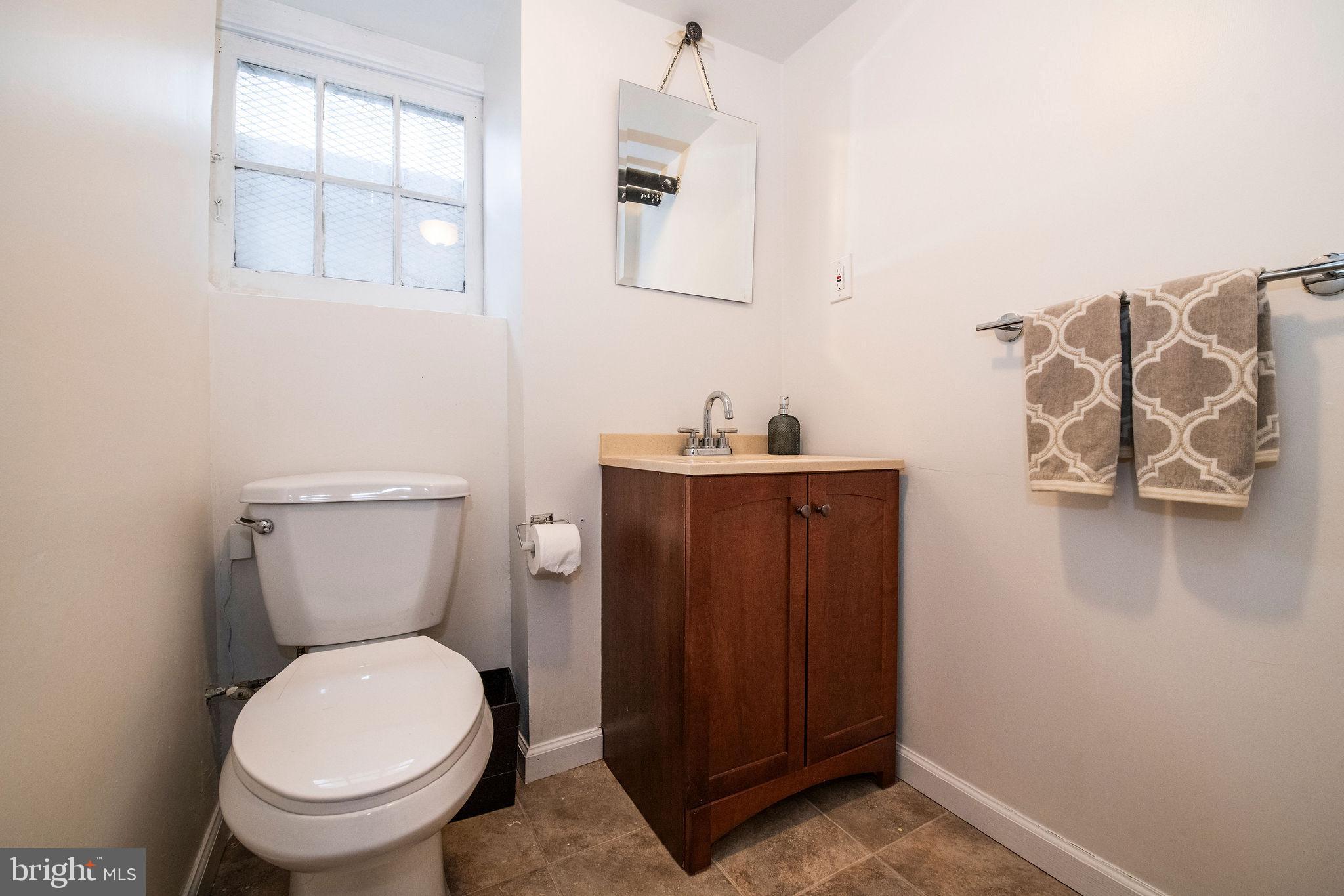 467 West Ellet Street Philadelphia, PA 19119 - Photo 31 of 39 a bathroom with a toilet and a sink