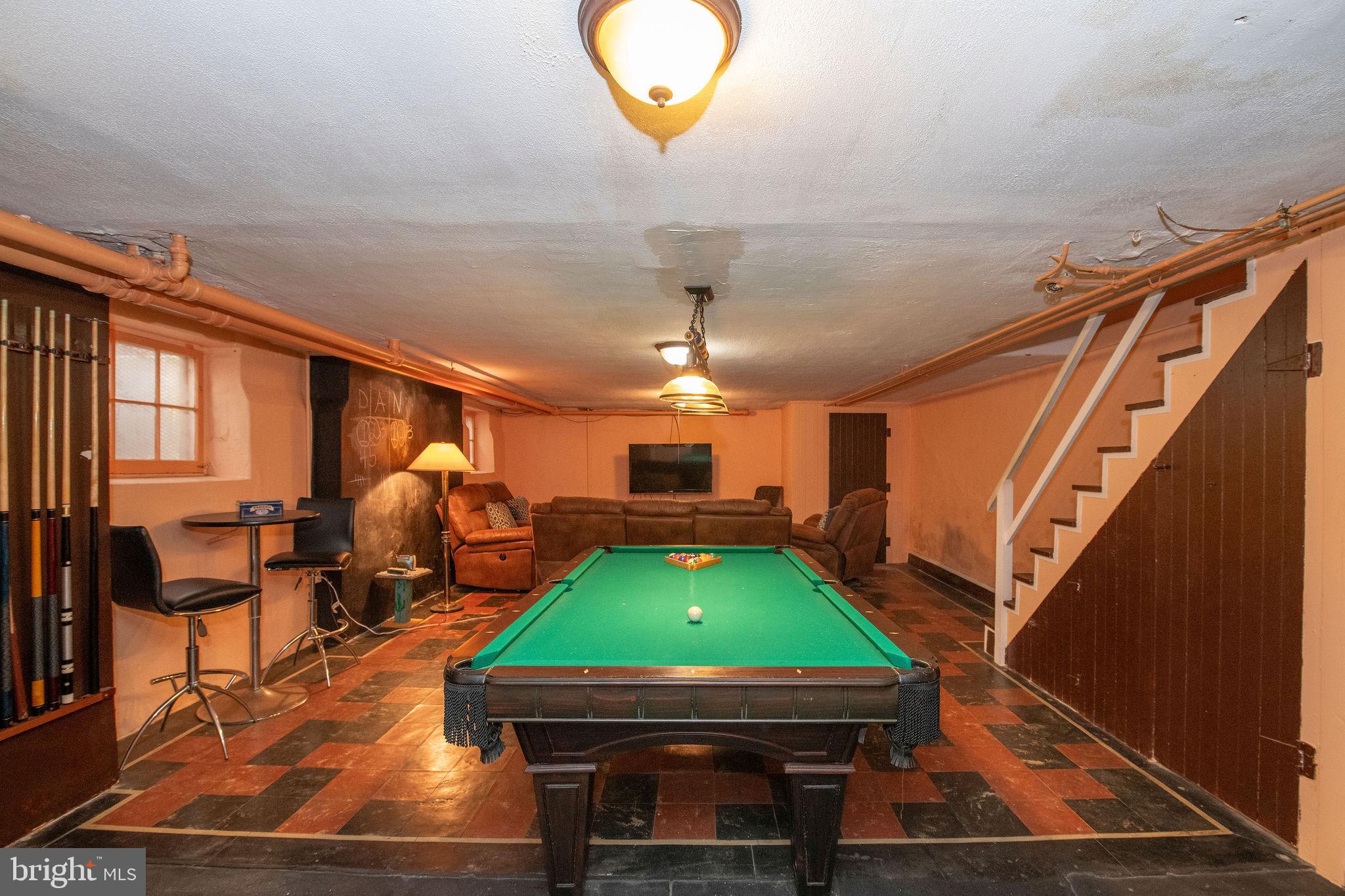 467 West Ellet Street Philadelphia, PA 19119 - Photo 32 of 39 a room with furniture a rug and pool table