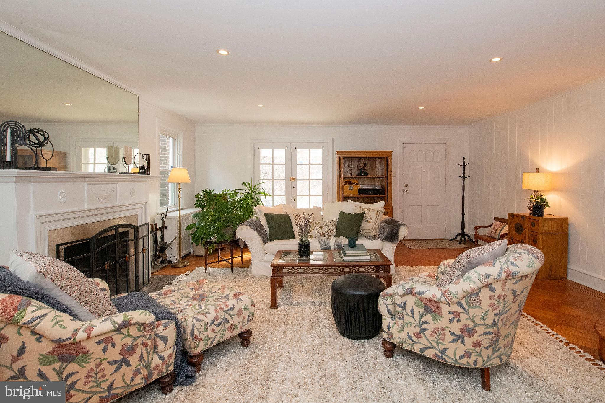 467 West Ellet Street Philadelphia, PA 19119 - Photo 5 of 39 a living room with furniture and a fireplace
