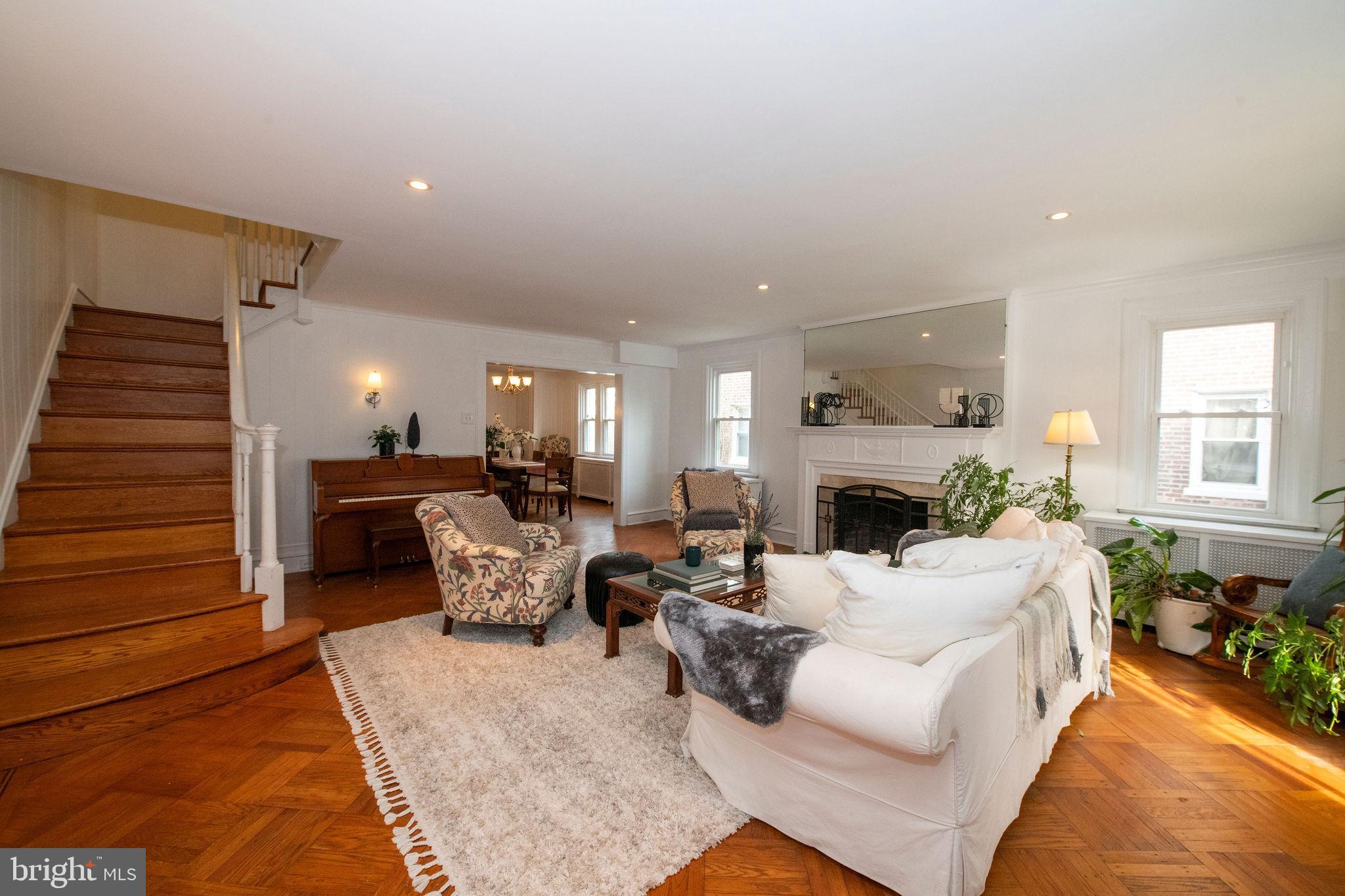 467 West Ellet Street Philadelphia, PA 19119 - Photo 6 of 39 a living room with furniture fireplace and windows