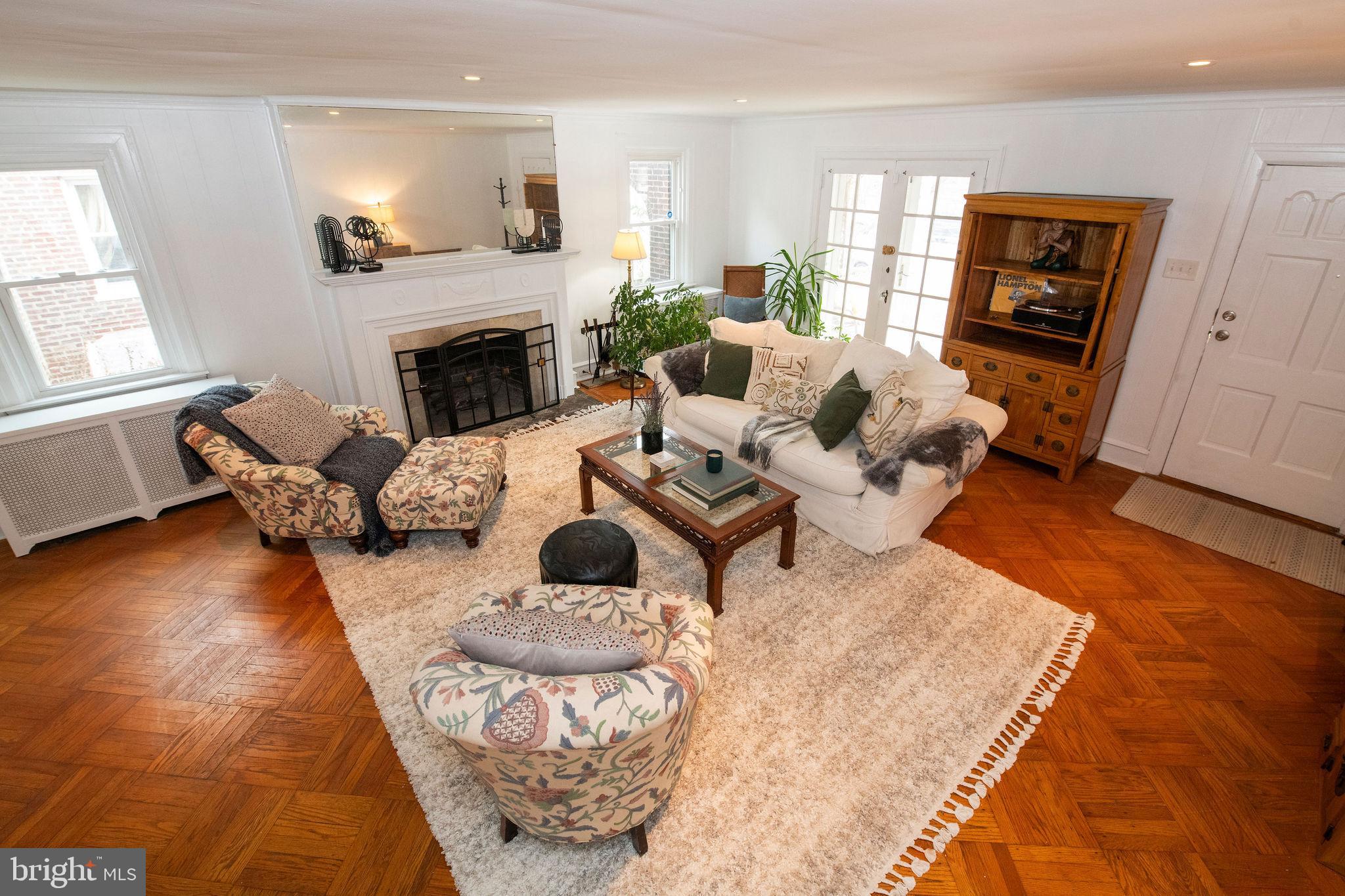 467 West Ellet Street Philadelphia, PA 19119 - Photo 8 of 39 a living room with furniture and a fireplace