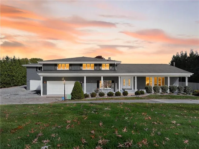a house view with a garden space