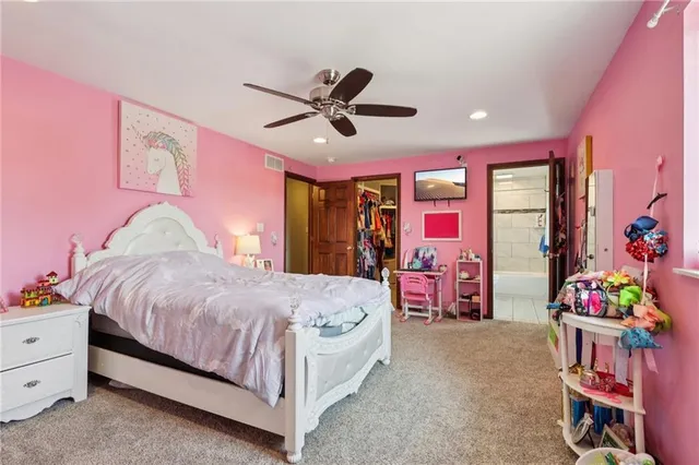 a kitchen that has a lot of cabinets in it