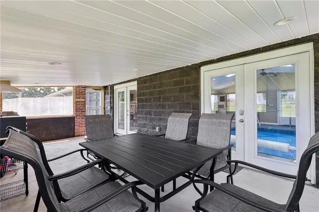 a room with lots of furniture and equipment