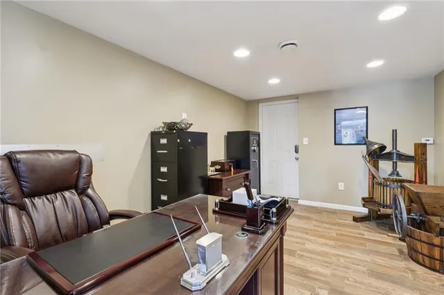 a workspace with furniture and window