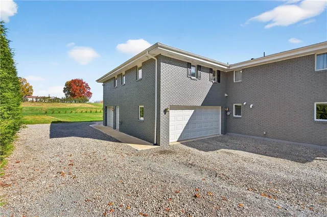 a view of a building with sitting area