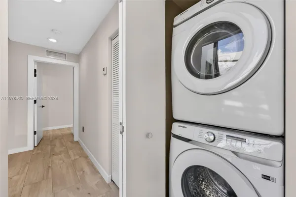 a view of washer and dryer in a utility room
