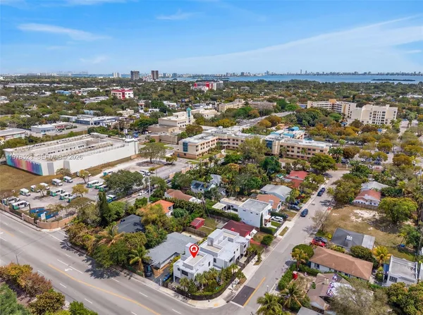 an aerial view of a city with lots of residential buildings