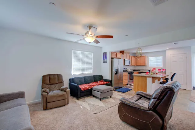 a room with furniture and a window