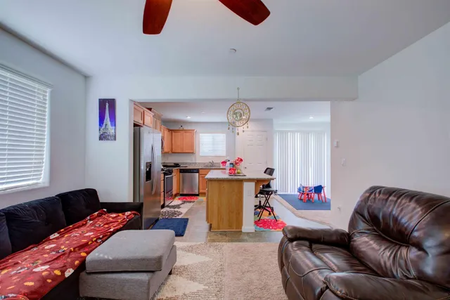 a living room with furniture and a couch