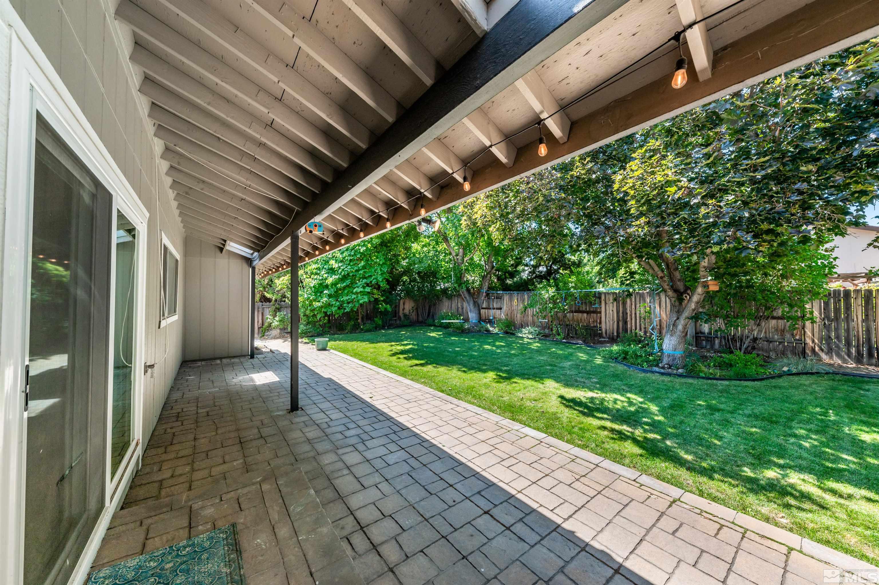 4795 Warren Way Reno, NV 89509 - Photo 29 of 40 a view of a patio with a yard