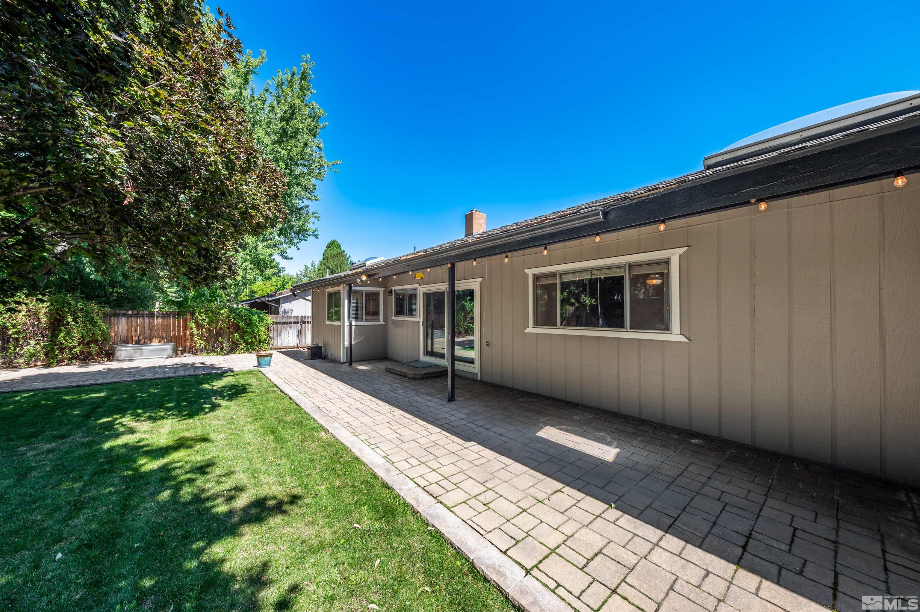 4795 Warren Way Reno, NV 89509 - Photo 30 of 40 a view of a house with a yard