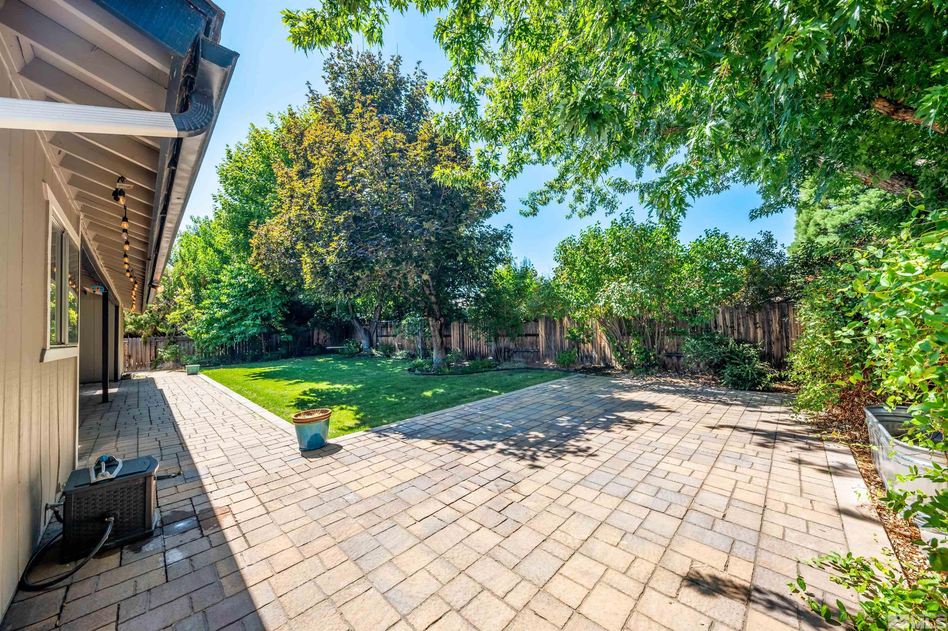 4795 Warren Way Reno, NV 89509 - Photo 35 of 40 a view of outdoor space yard deck and patio