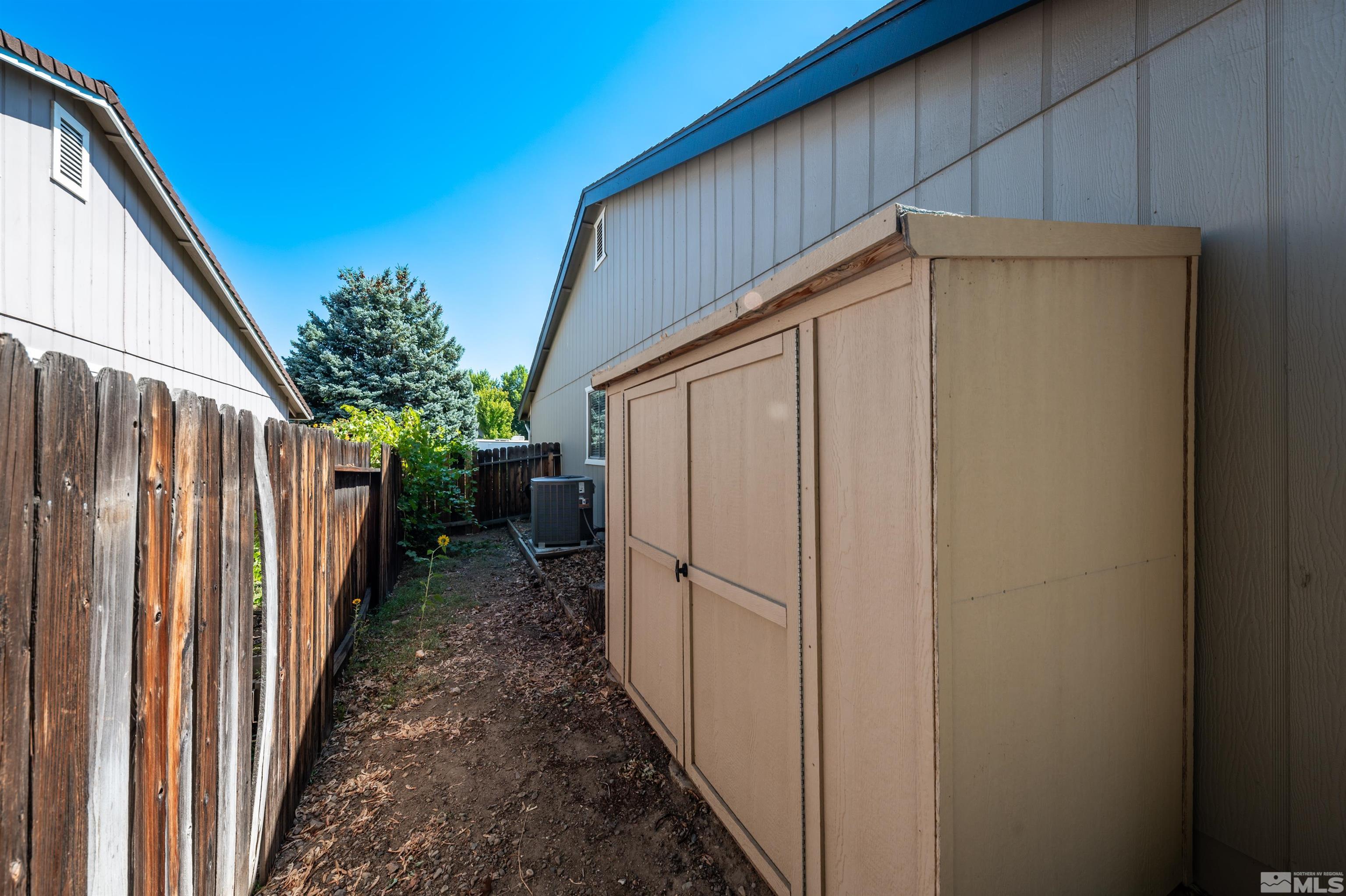 4795 Warren Way Reno, NV 89509 - Photo 39 of 40 a view of a house with wooden fence