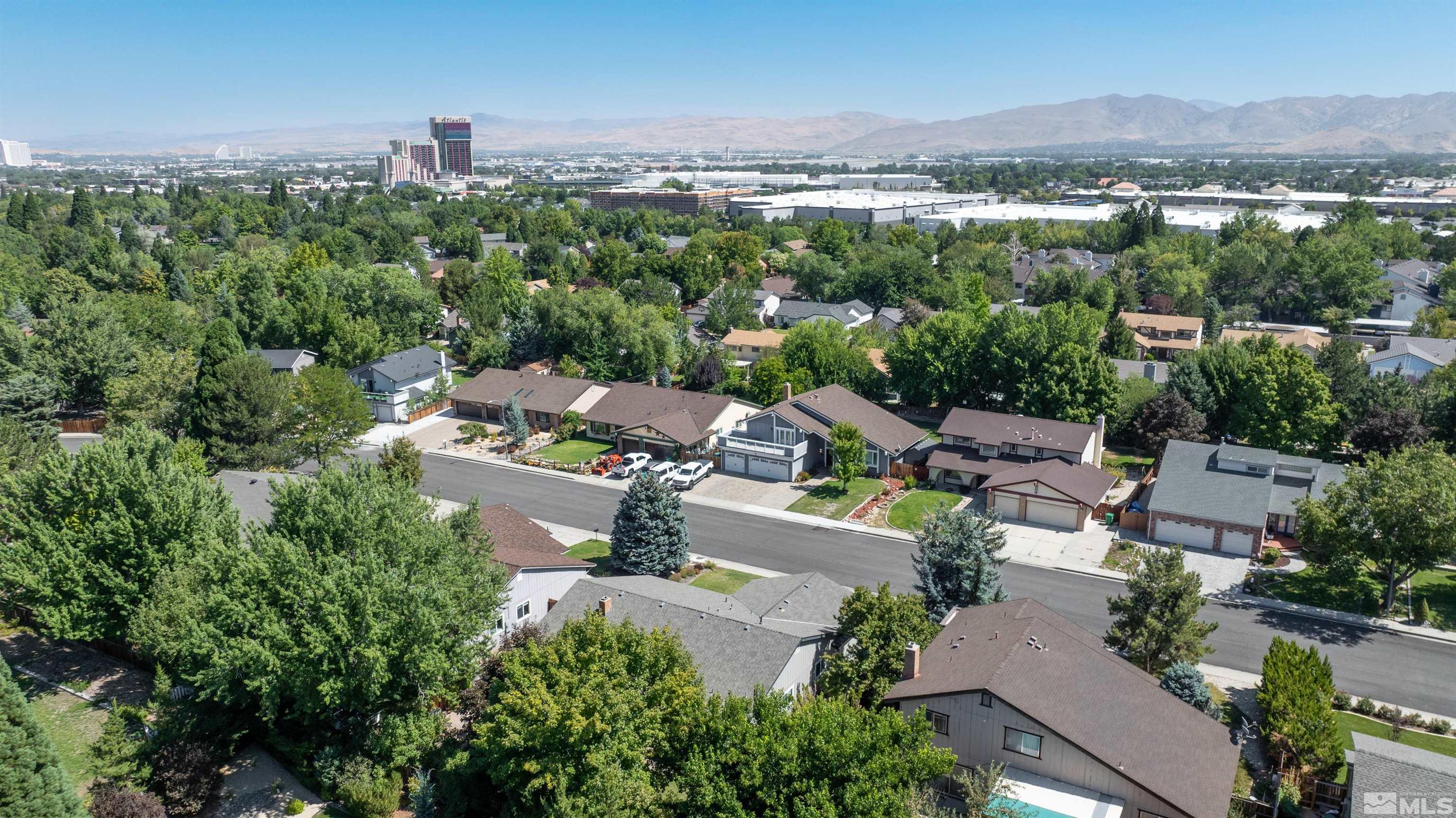 4795 Warren Way Reno, NV 89509 - Photo 40 of 40 an aerial view of a city with lots of residential buildings
