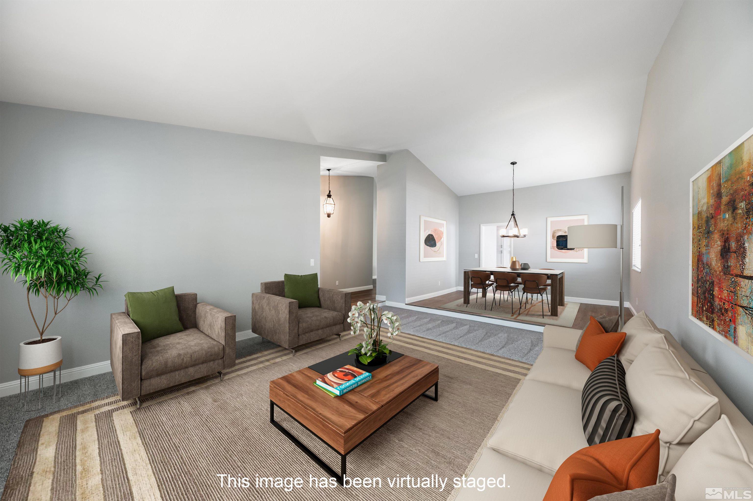 4795 Warren Way Reno, NV 89509 - Photo 5 of 40 a living room with furniture and a couch