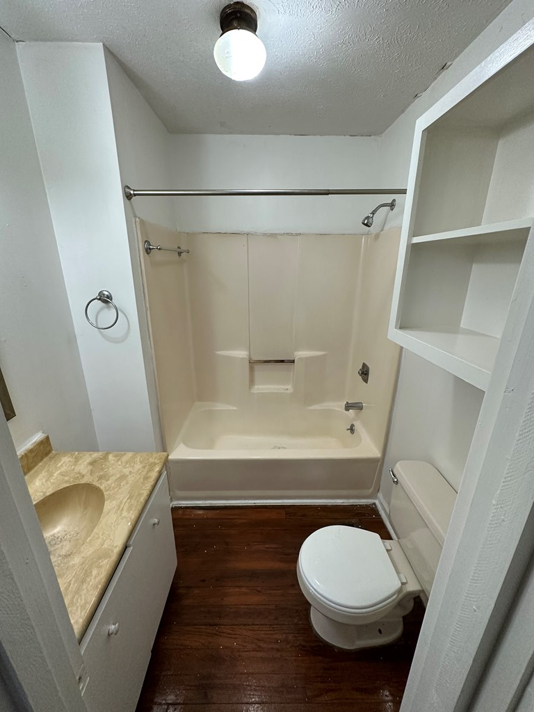 1329 19th Street, Unit B Columbus, GA 31901 - Photo 5 of 5 a bathroom with a tub and a sink