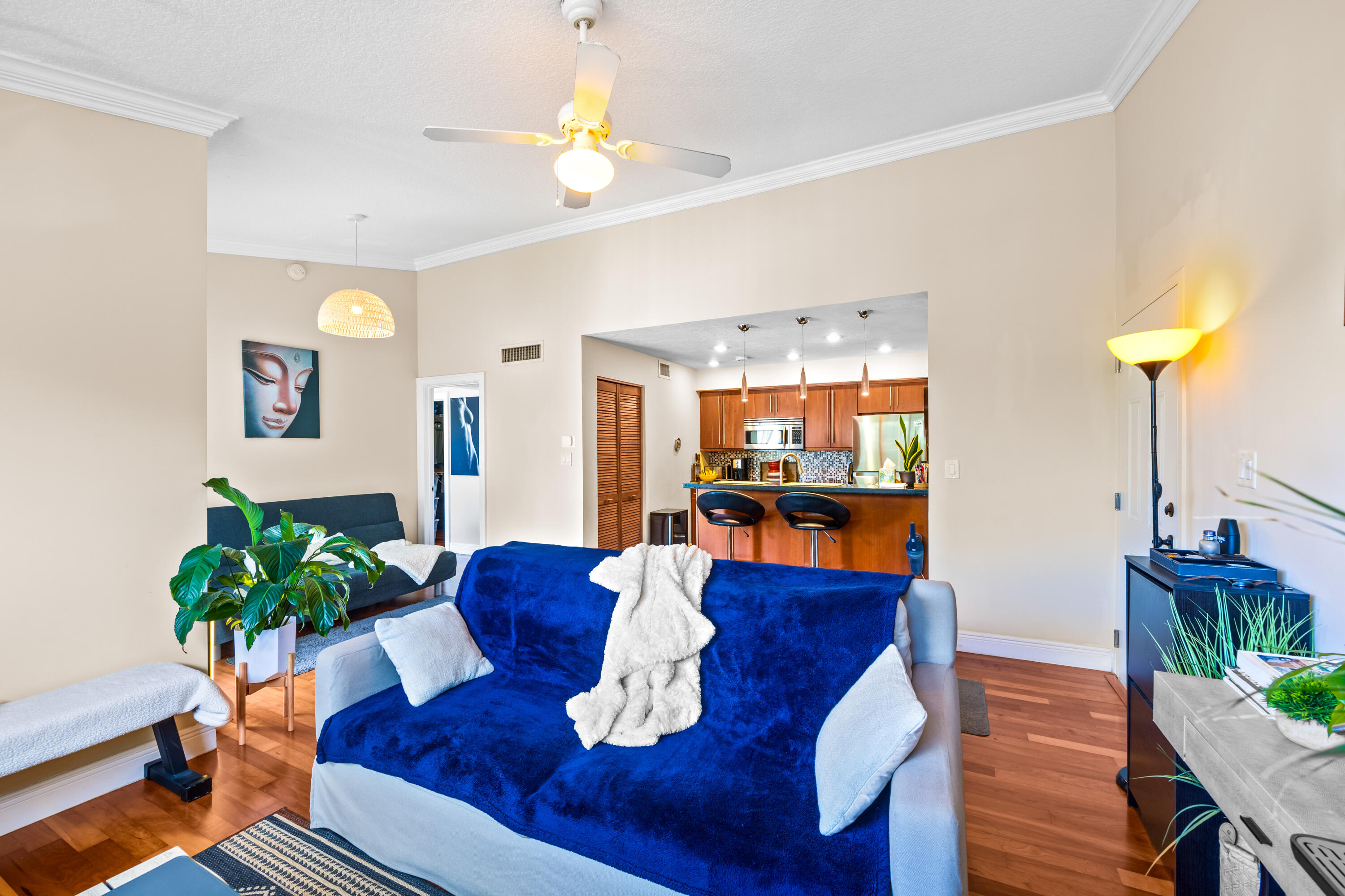 550 South Park Road, Unit 318 Hollywood, FL 33021 - Photo 1 of 27 a living room with furniture and a potted plant