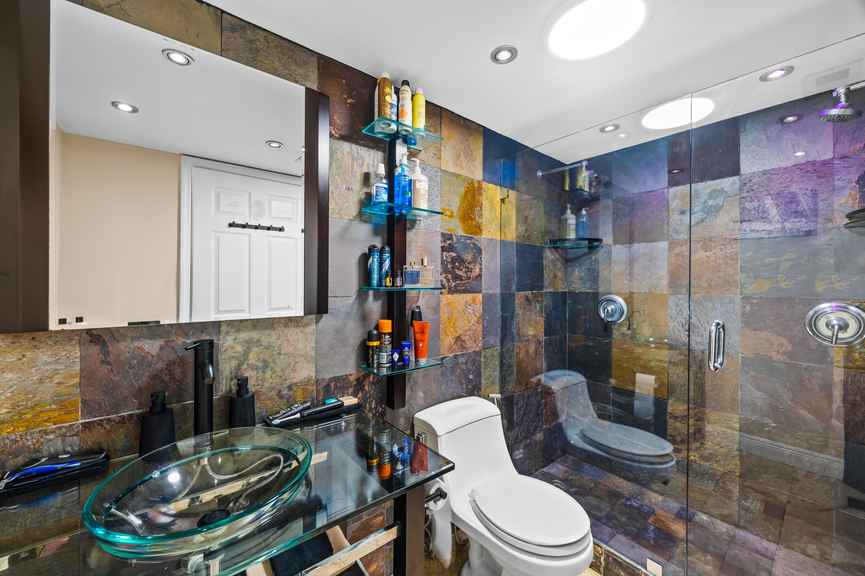 550 South Park Road, Unit 318 Hollywood, FL 33021 - Photo 14 of 27 a bathroom with a sink toilet and shower