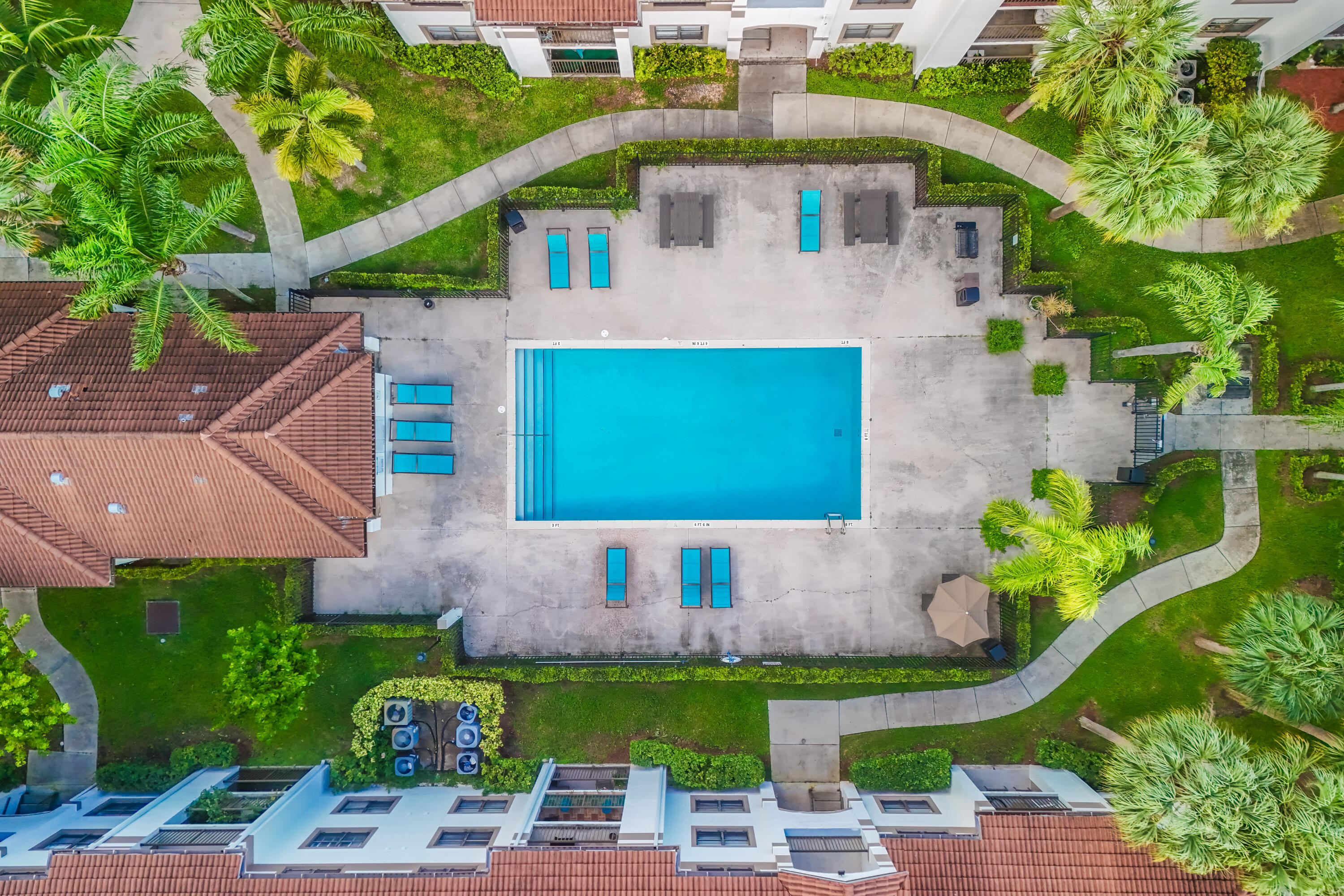 550 South Park Road, Unit 318 Hollywood, FL 33021 - Photo 17 of 27 an aerial view of a house with a garden and plants